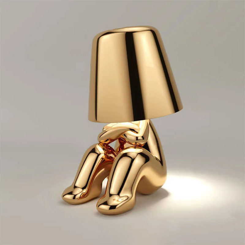Plankglow | gouden man tafellamp