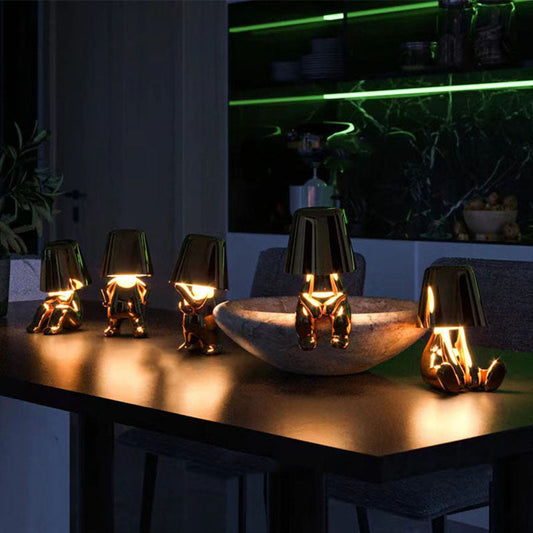 Plankglow | gouden man tafellamp